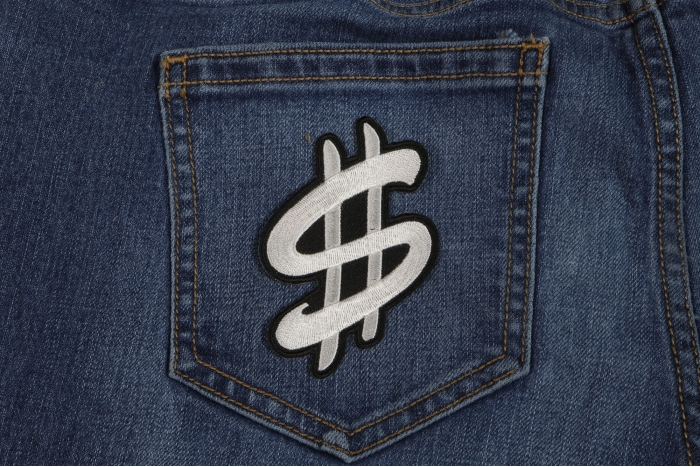 Dollar Sign Iron on Novelty Patch shown on jeans