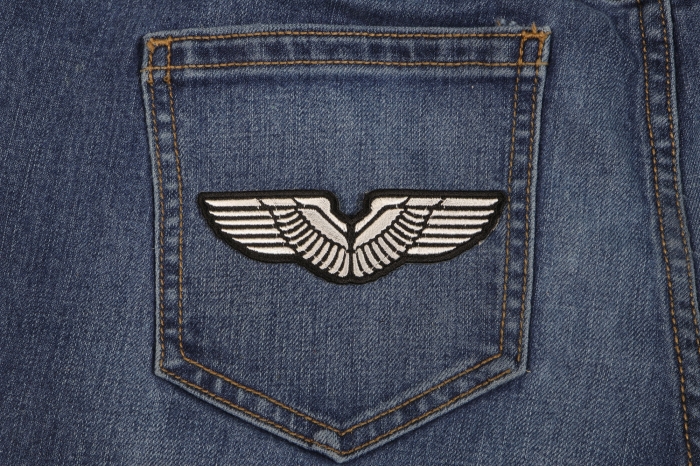 White Wings Patch shown on jeans