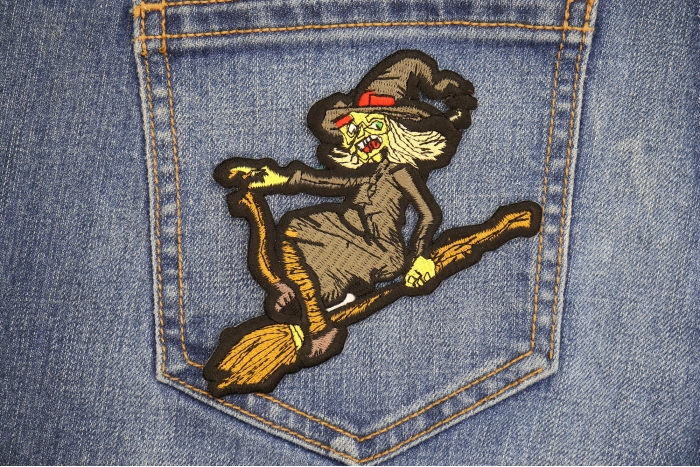 Witch on a Broom Patch shown on jeans