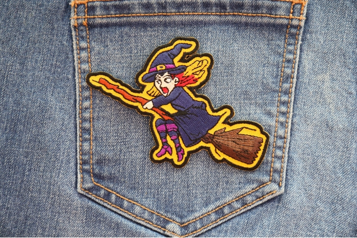 Witch on a Broom Patch shown on jeans