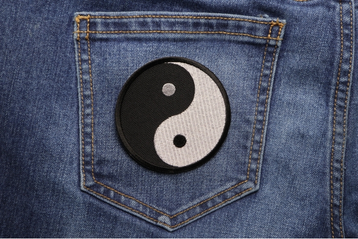 Ying Yang Novelty Iron on Patch shown on jeans