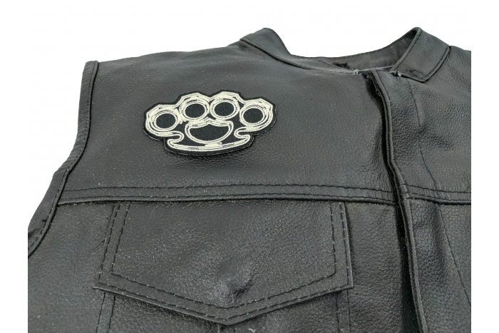 Brass Knuckles Patch - 3.5x2 inch. Embroidered Iron on Patch shown on leather vest