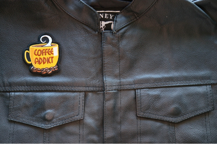 Coffee Addict Patch shown on leather vest