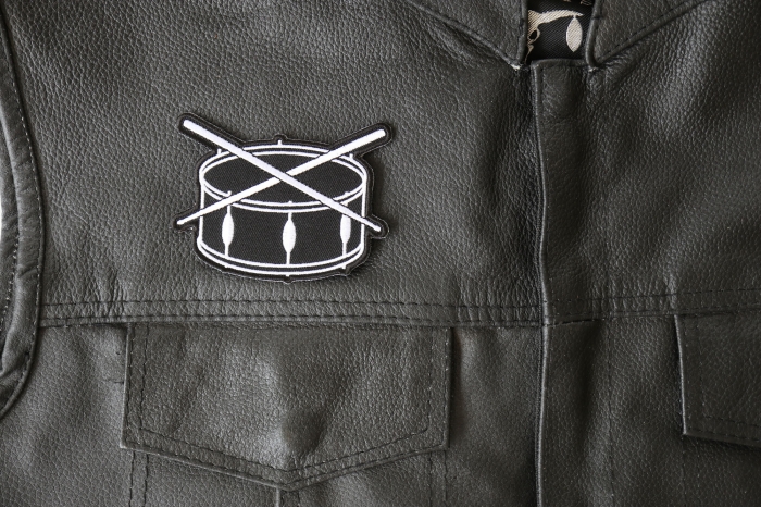 Drum and Sticks Music Band Patch - 3.5x2.7 inch - Embroidered Iron on Patch shown on leather vest