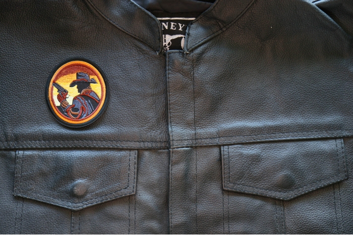 Gun Slinger Patch, Iron on Patches shown on leather vest