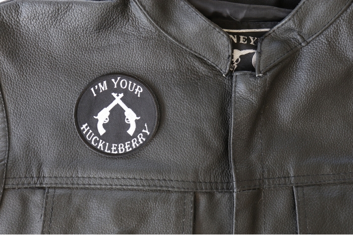 I'm Your Huckleberry Black White Patch - 3x3 inch - Embroidered Iron on Patch shown on leather vest