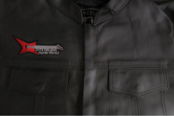 If it's too loud you're too old guitar patch shown on leather vest