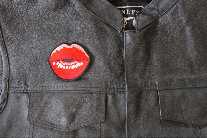 Kissing Lips Small Patch - 3x2.7 inch - Embroidered Iron on Patch shown on leather vest
