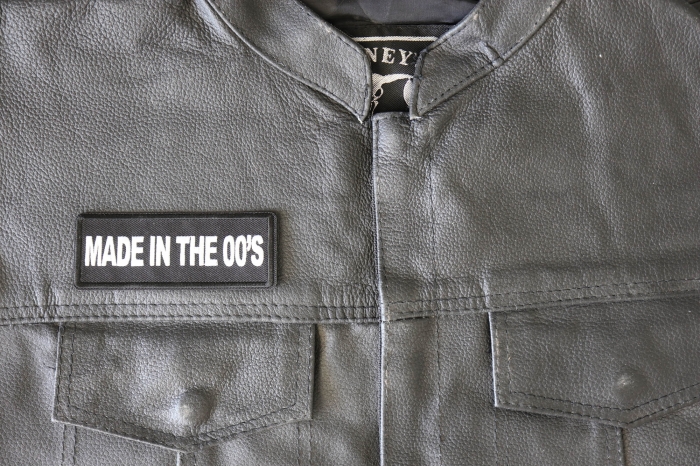 Made in the 00's Patch - 4x1.5 inch - Embroidered Iron on Patch shown on leather vest
