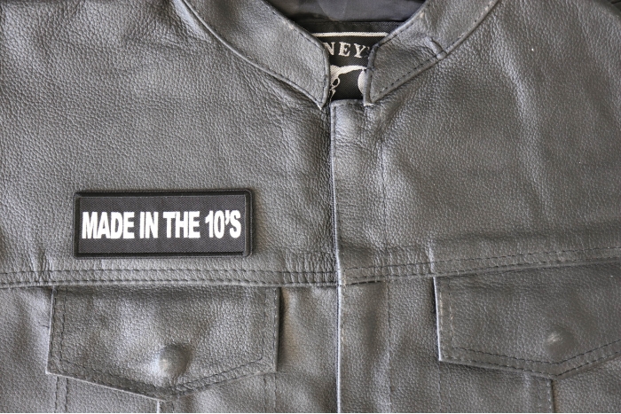 Made in the 10's Patch - 4x1.5 inch - Embroidered Iron on Patch shown on leather vest