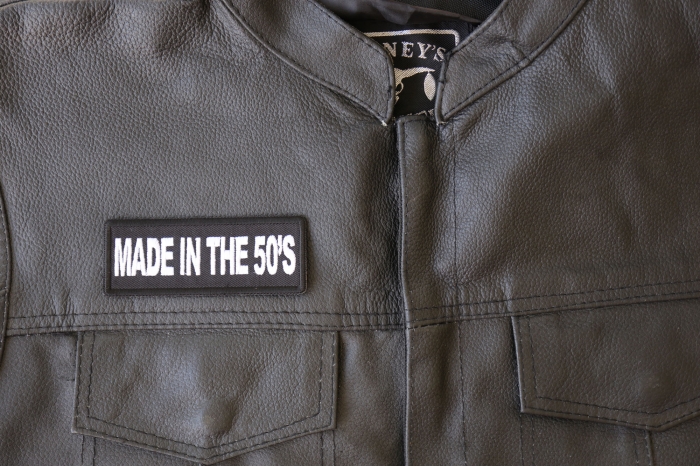 Made in the 50's Patch - 4x1.5 inch - Embroidered Iron on Patch shown on leather vest