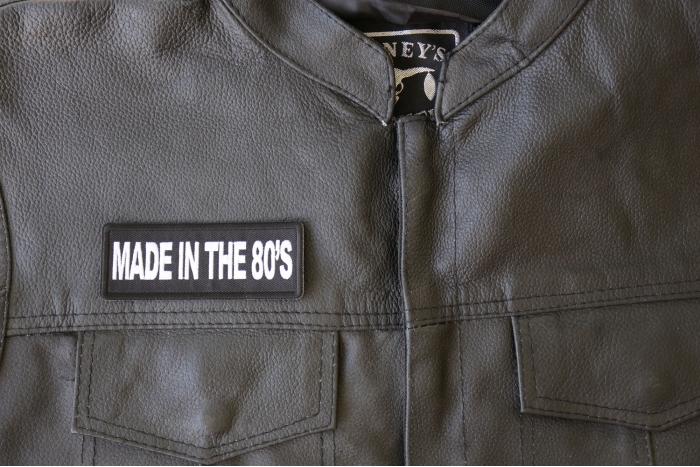 MAde in the 80s Patch - 4x1.5 inch - Embroidered Iron on Patch shown on leather vest