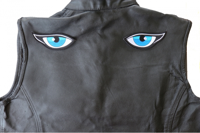 Medium Blue Eyes Patches - 4.5x1.75 inch - Embroidered Iron on Patch shown on leather vest