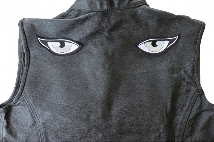 Medium Silver Eyes Patches - 4.5x1.75 inch - Embroidered Iron on Patch shown on leather vest