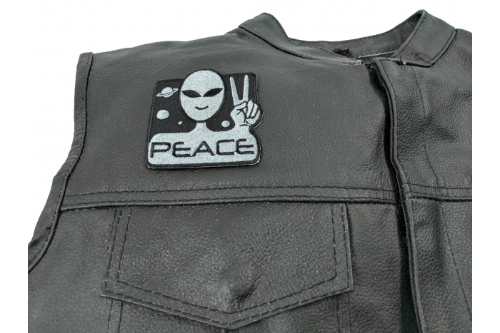 Peace Alien Fun Patch - 3x3 inch. Embroidered Iron on Patch shown on leather vest