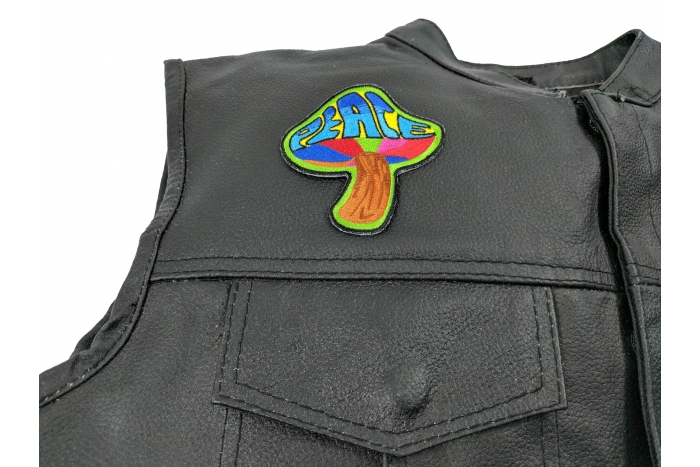 Peace Mushroom Patch Psychedelic Hippie - 3x3.25 inch. Embroidered Iron on Patch shown on leather vest
