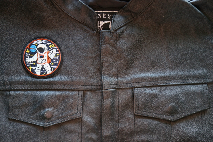 Cosmic Astronaut Patch, Iron on Patches shown on leather vest