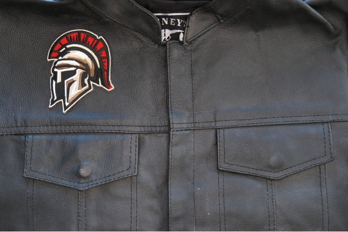 Spartan Helmet Patch shown on leather vest