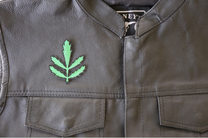 Symmetric Leaves Patch - 2.5x3 inch. Embroidered Iron on Patch shown on leather vest