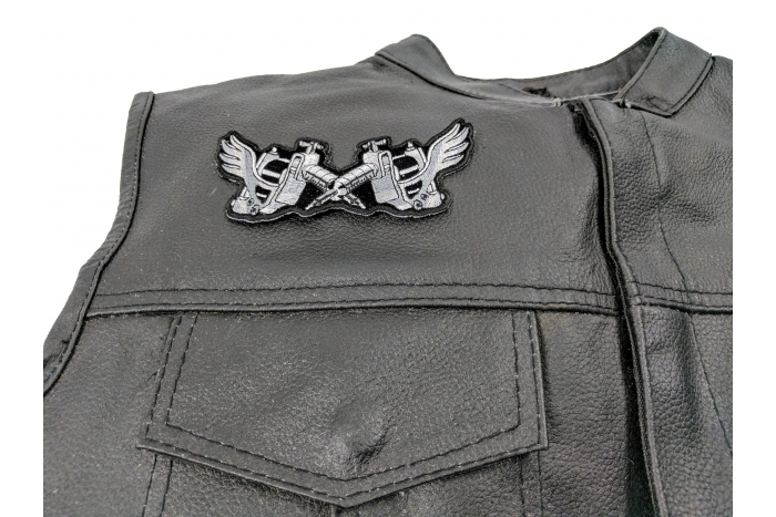 Tattoo Guns Wings Patch Small - 4.5x2 inch - Embroidered Iron on Patch shown on leather vest