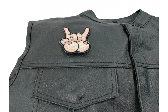 Tits and Rock On Fun Iron On Patch - 3x3 inch. Embroidered Iron on Patch shown on leather vest