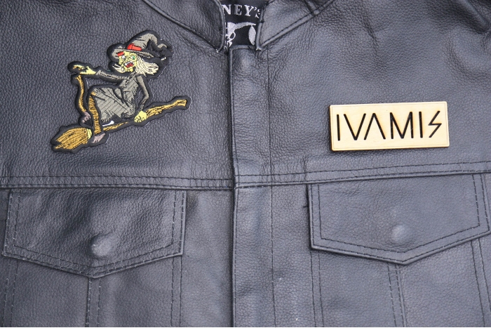 Witch on a Broom Patch shown on leather vest