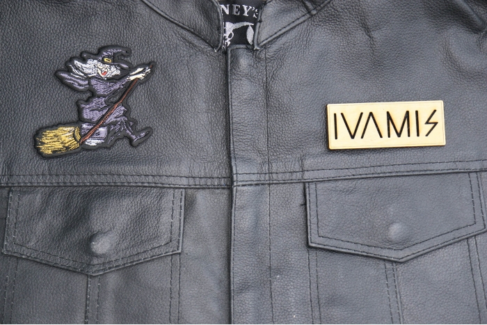 Witch Riding Broom Patch shown on leather vest