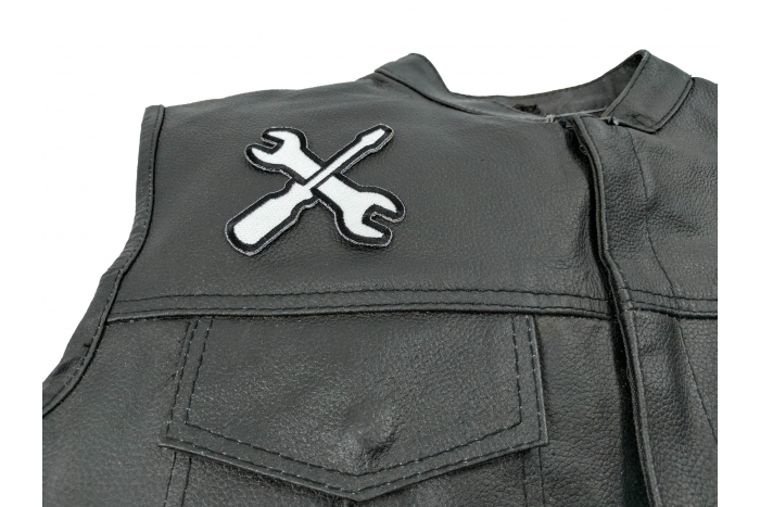 Wrench and Screwdriver Iron on Patch - 3x3 inch shown on leather vest
