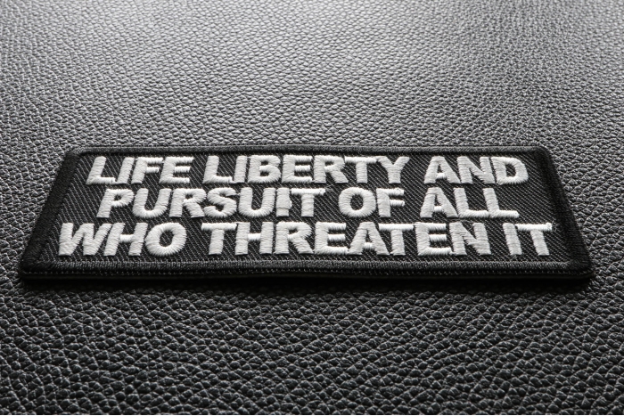 Life Liberty and Pursuit of All Who Threaten it Patriotic Iron on Patch diagonal view