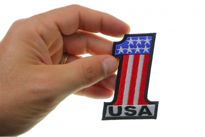 1 USA Patriotic Iron on Patch shown on hand for size comparison