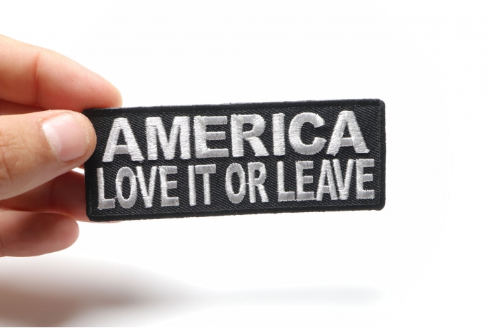 America Love It or Leave Patch, Military Saying Patches shown on hand for size comparison