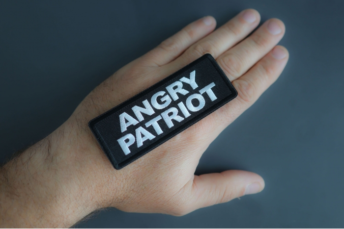 Angry Patriot Patch shown on hand for size comparison