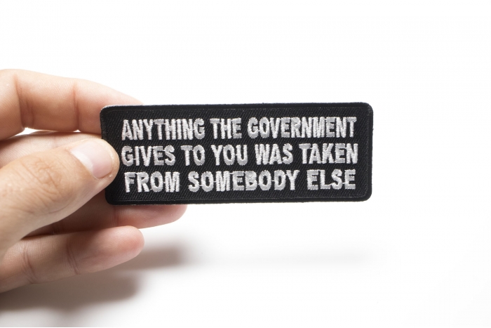 Anything The Government Gives To You Was Taken From Someone Else Patch shown on hand for size comparison