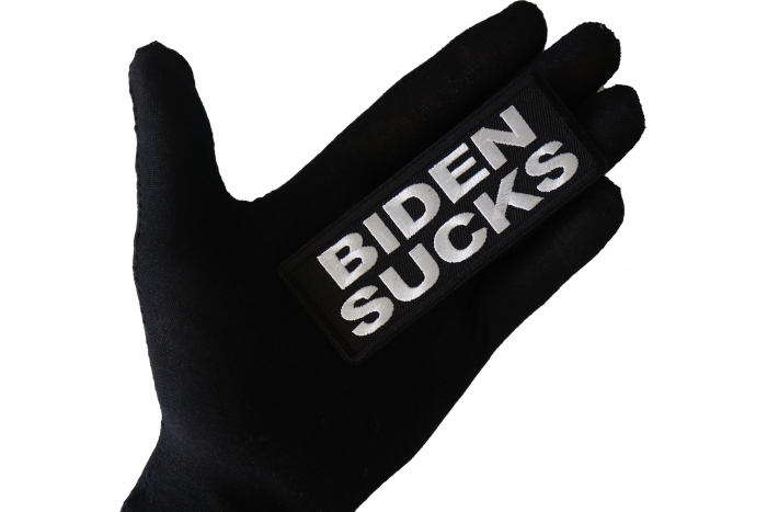 Biden Sucks Patch shown on hand for size comparison