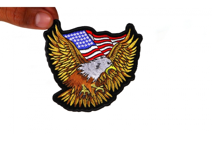 Gold Eagle Patriotic Iron on Patch With US Flag Small shown on hand for size comparison