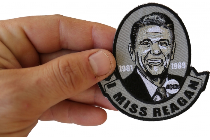 I miss Reagan Patriotic Iron on Patch shown on hand for size comparison