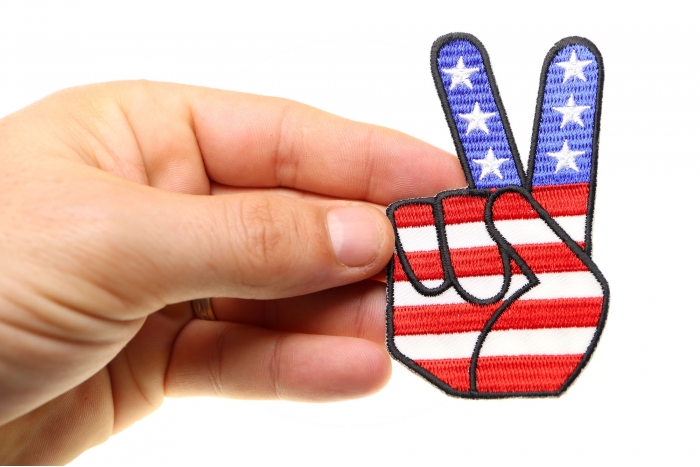 Peace Hand Sign with American Flag Patriotic Iron on Patch shown on hand for size comparison