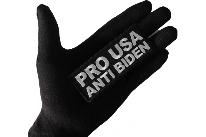 Pro USA Anti Biden Patch shown on hand for size comparison