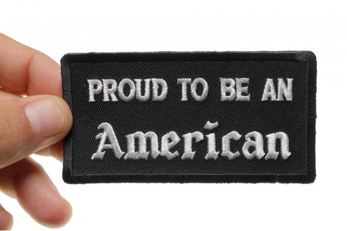 Proud To Be An American Patch, Patriotic Saying Patches shown on hand for size comparison