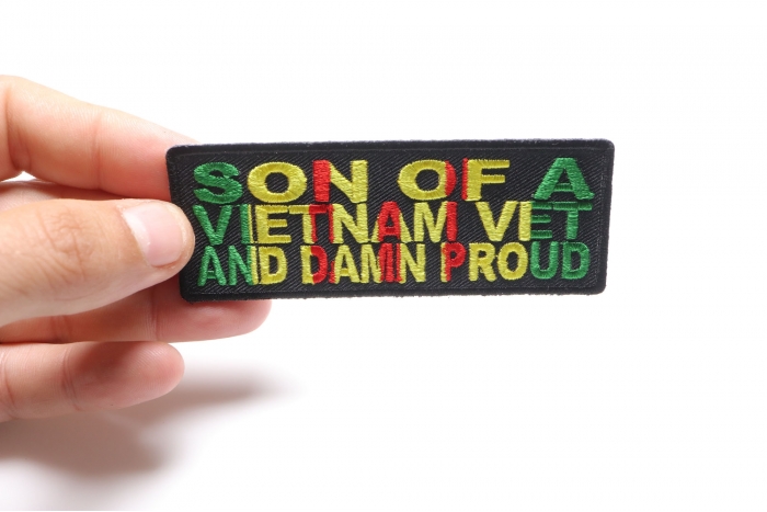 Son Of A Vietnam Vet and Damn Proud Patriotic Iron on Patch shown on hand for size comparison