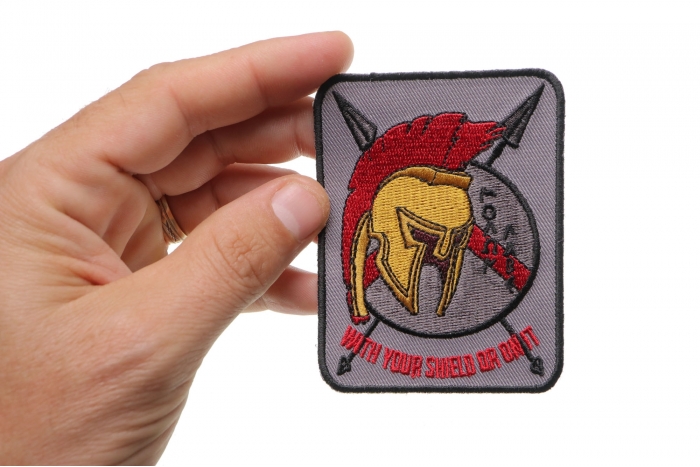  shown on hand for size comparison