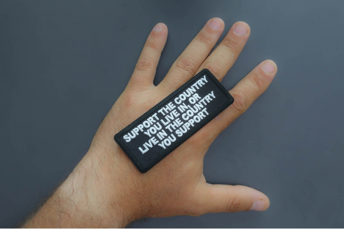 Support The Country you live in or Live in the country you support Patch shown on hand for size comparison