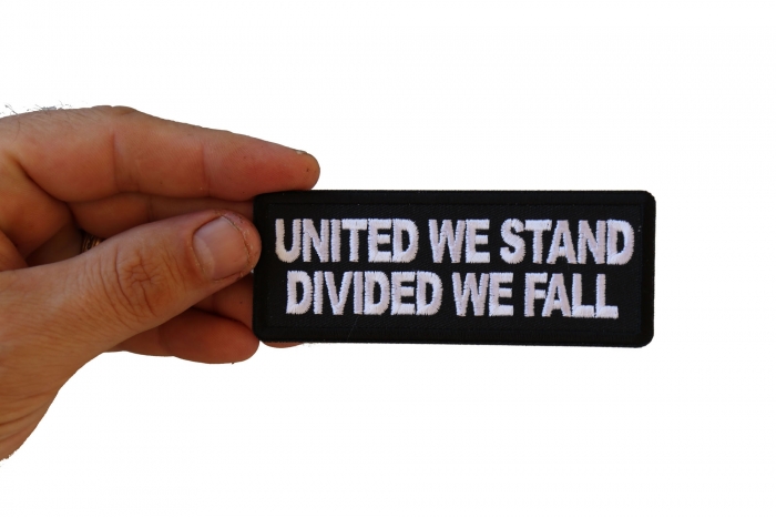 United We Stand Divided We Fall Patch, Patriotic Patches shown on hand for size comparison