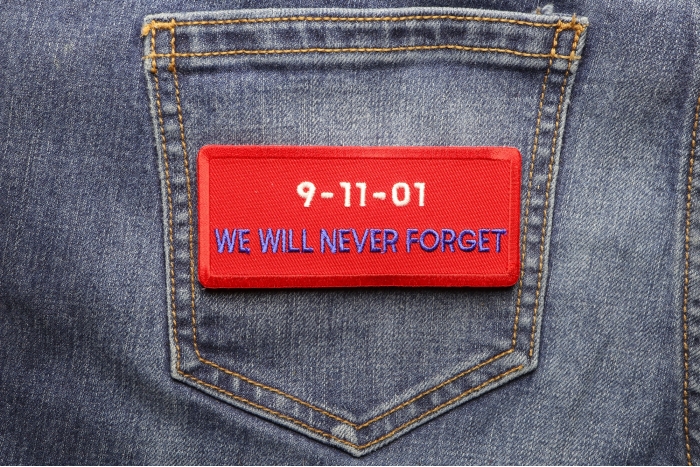 9 11 01 We Will Never Forget Patch shown on jeans