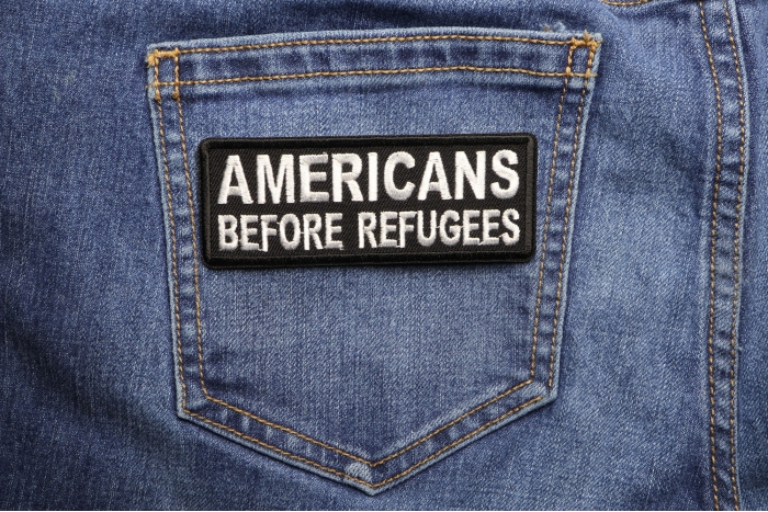 Americans Before Refugees Patriotic Iron on Patch shown on jeans
