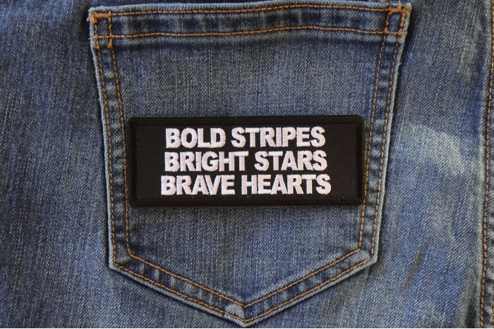 Bold Stripes Bright Stars Brave Hearts Patch shown on jeans