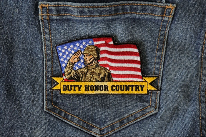 Duty Honor Country Patch Soldier Saluting with American Flag shown on jeans