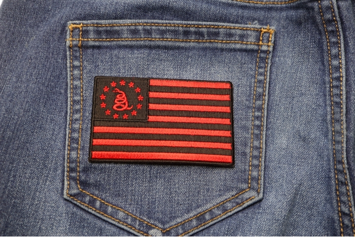 Gadsden American Flag Red Black Patch shown on jeans