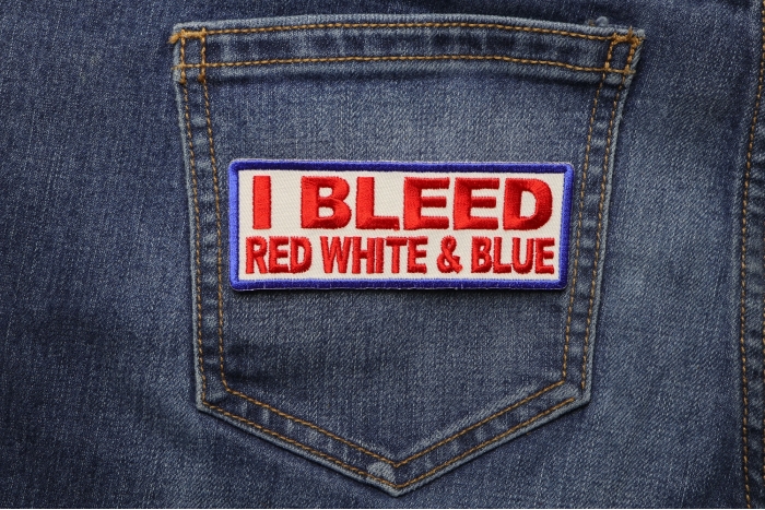 I Bleed Red White and Blue Patriotic Iron on Patch shown on jeans
