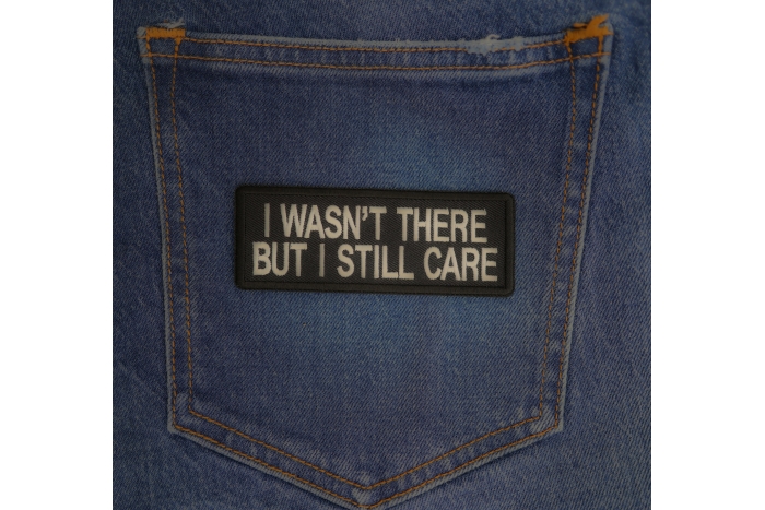 I Wasn't There But I Still Care Patch shown on jeans